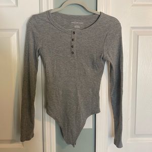 Gray long sleeve body suit